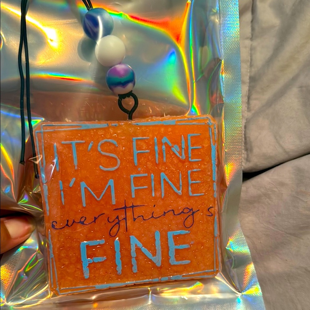 It’s fine I’m fine everything’s fine car Freshie. Caribbean Sea breeze scented.